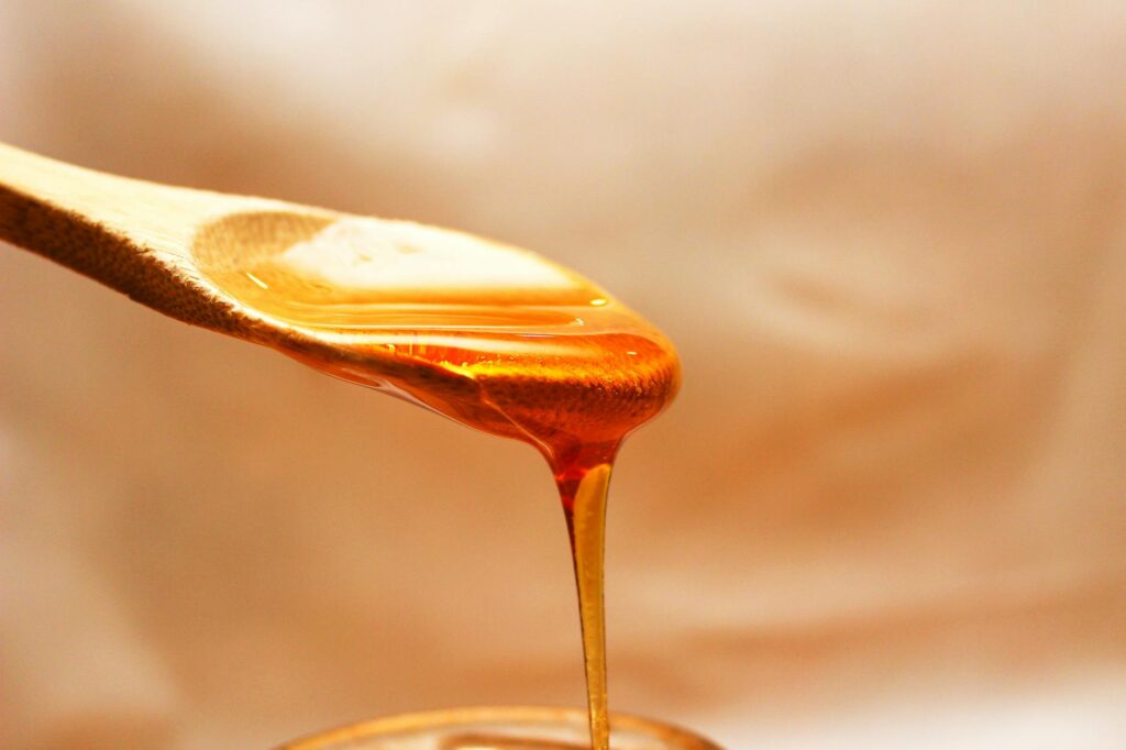 Does Applying Honey Help Clear Acne Naturally - Featured image